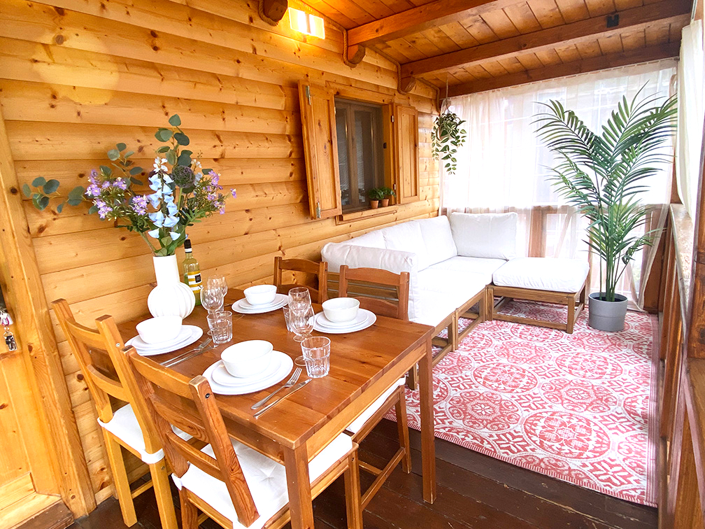 Woonkamer chalet Bruxelles 19 met zithoek