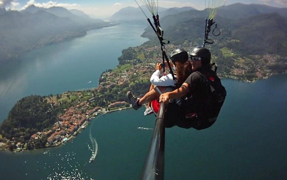 Tandem paragliden boven het Meer van Lugano vanuit 1.250 meter hoogte
